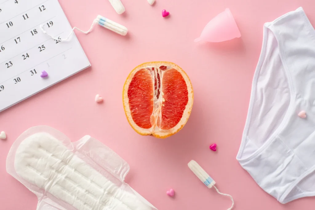 Menstrual products and cycle calendar representing menstrual health and irregular periods
